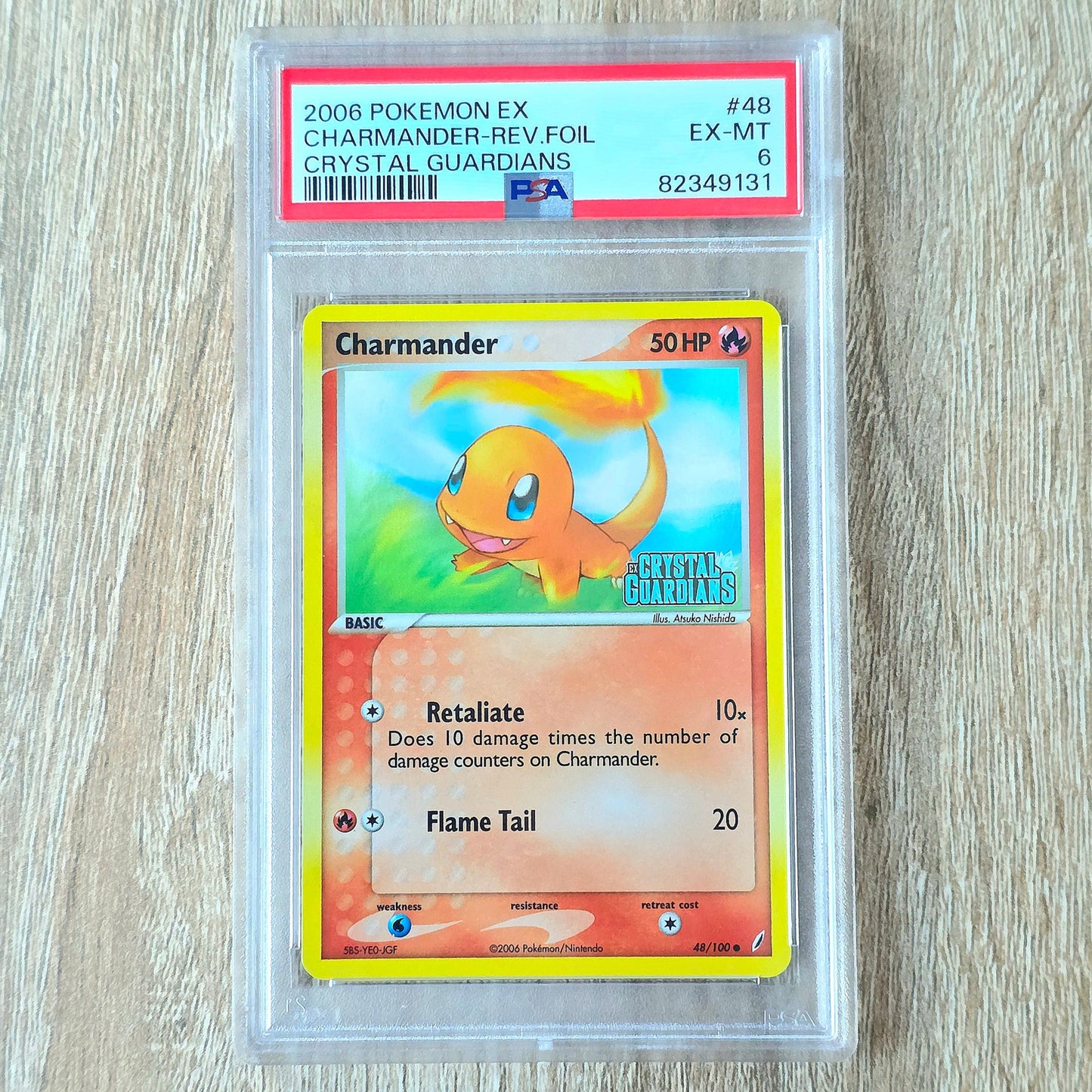 Pokemon TCG Charmander *Reverse Holo* Crystal Guardians 48/100 (PSA 6)